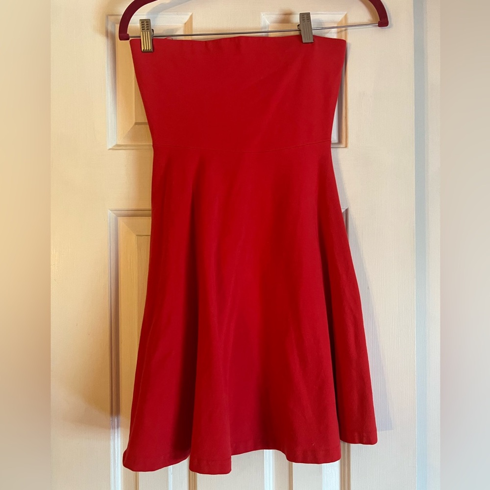 Hot pink strapless mini dress.